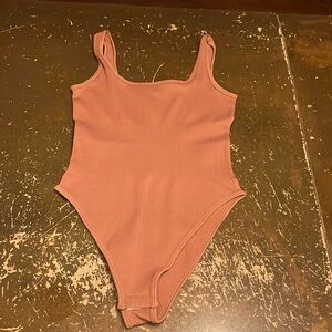 Body suit that will snatch u up and give u the perfect little waist.